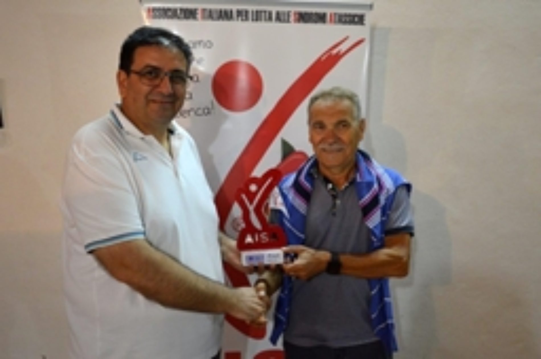 Trofeo “Aisa” consegnato a due atleti barresi che hanno portato in “alto” la bandiera dell’Aisa